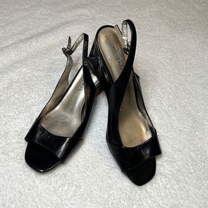 DANA BUCHMAN black wedge sling back , black Pat-ton leather .